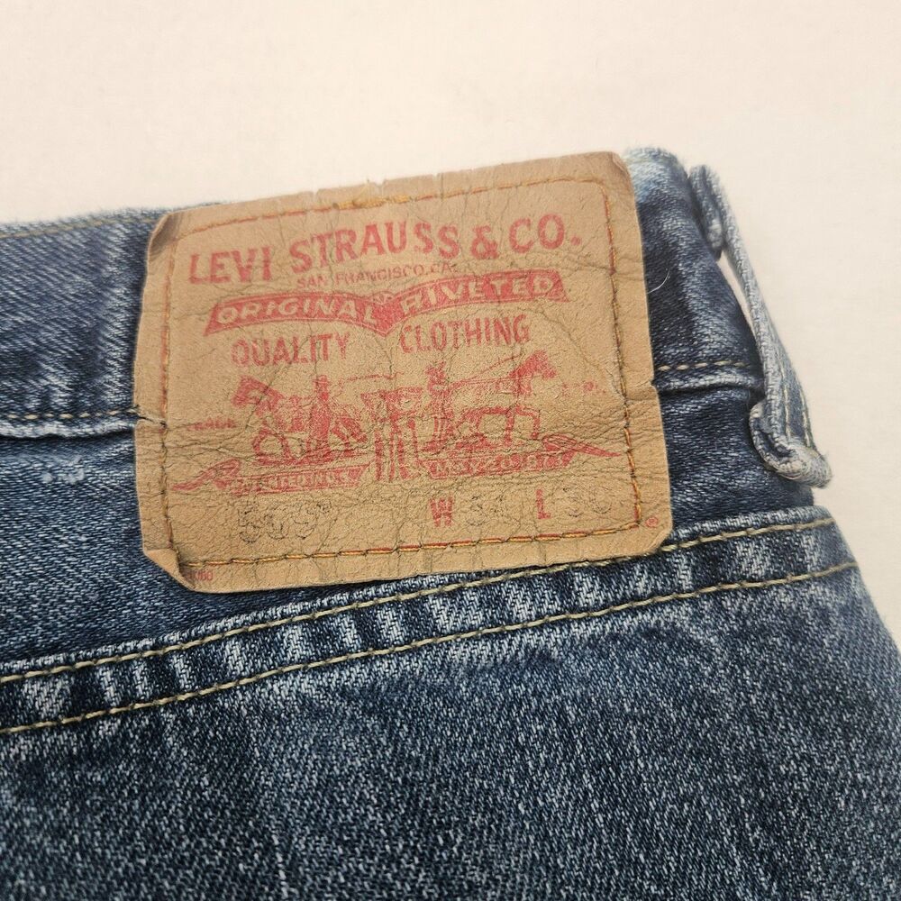 Levi's 569 Men's W34 L30 Loose Straight Fit Jeans Dark Blue Distressed Denim - Picture 3 of 9